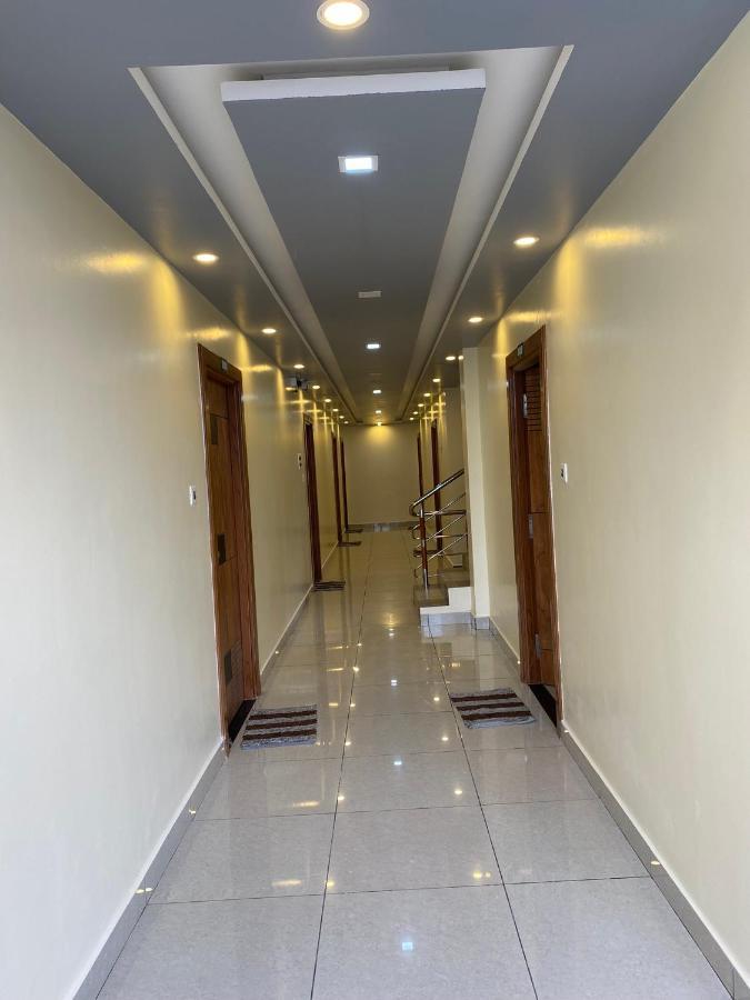 The Landmark Tower Tirunallar Bagian luar foto