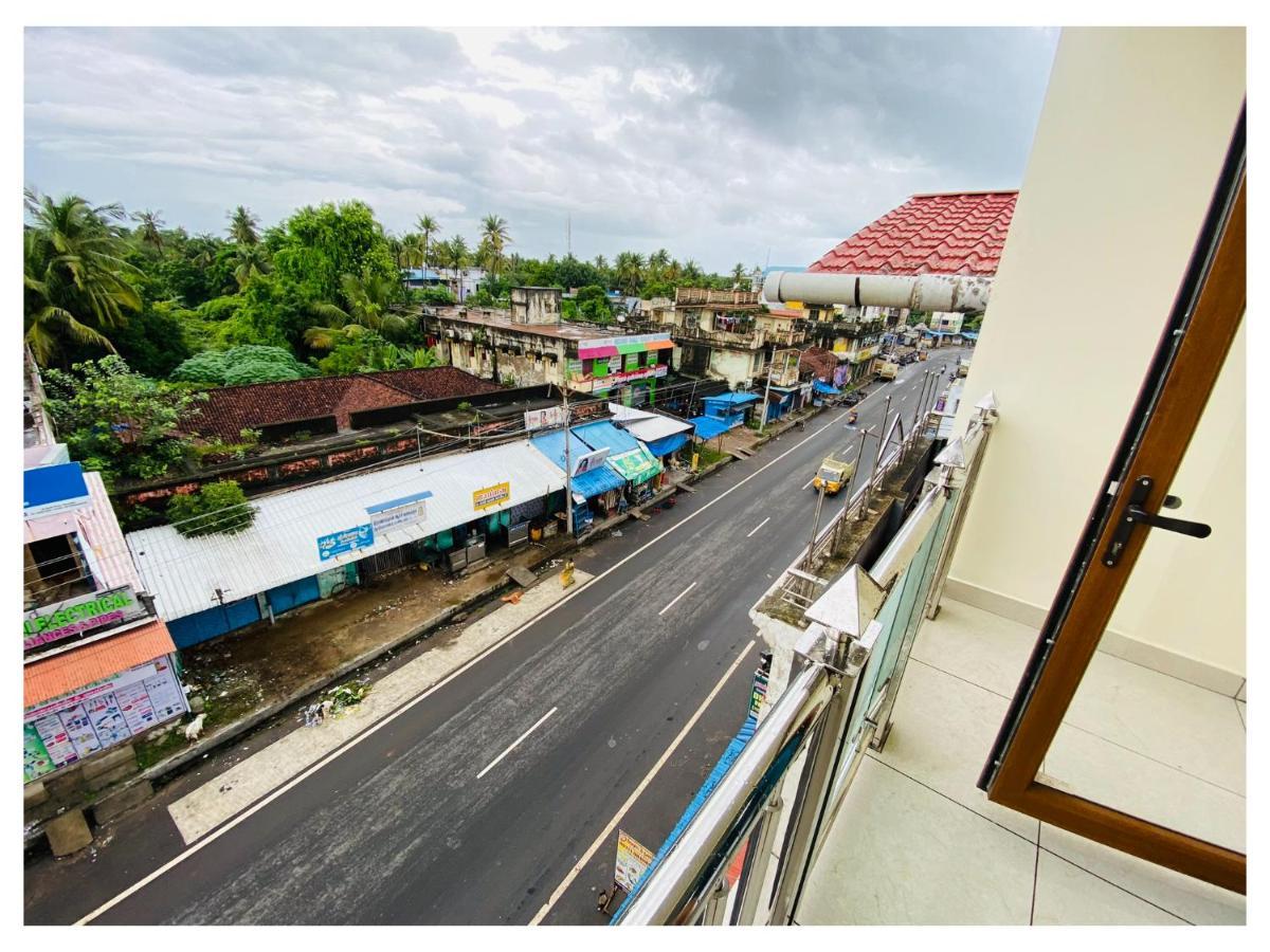 The Landmark Tower Tirunallar Bagian luar foto